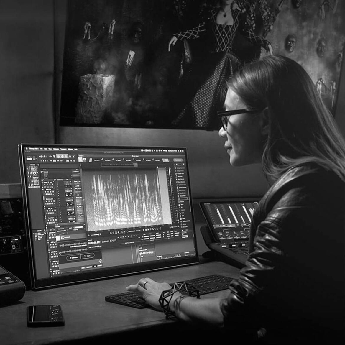 A post-production engineer using iZotope RX.